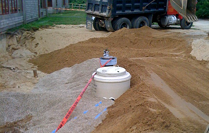 Backfill material being hauled in