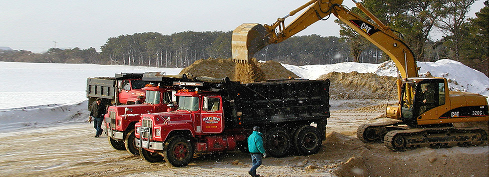 Stockpiled sand at the Reis Trucking materials yard